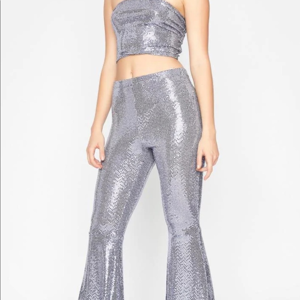 Sequin bell bottom pants. NWOT.